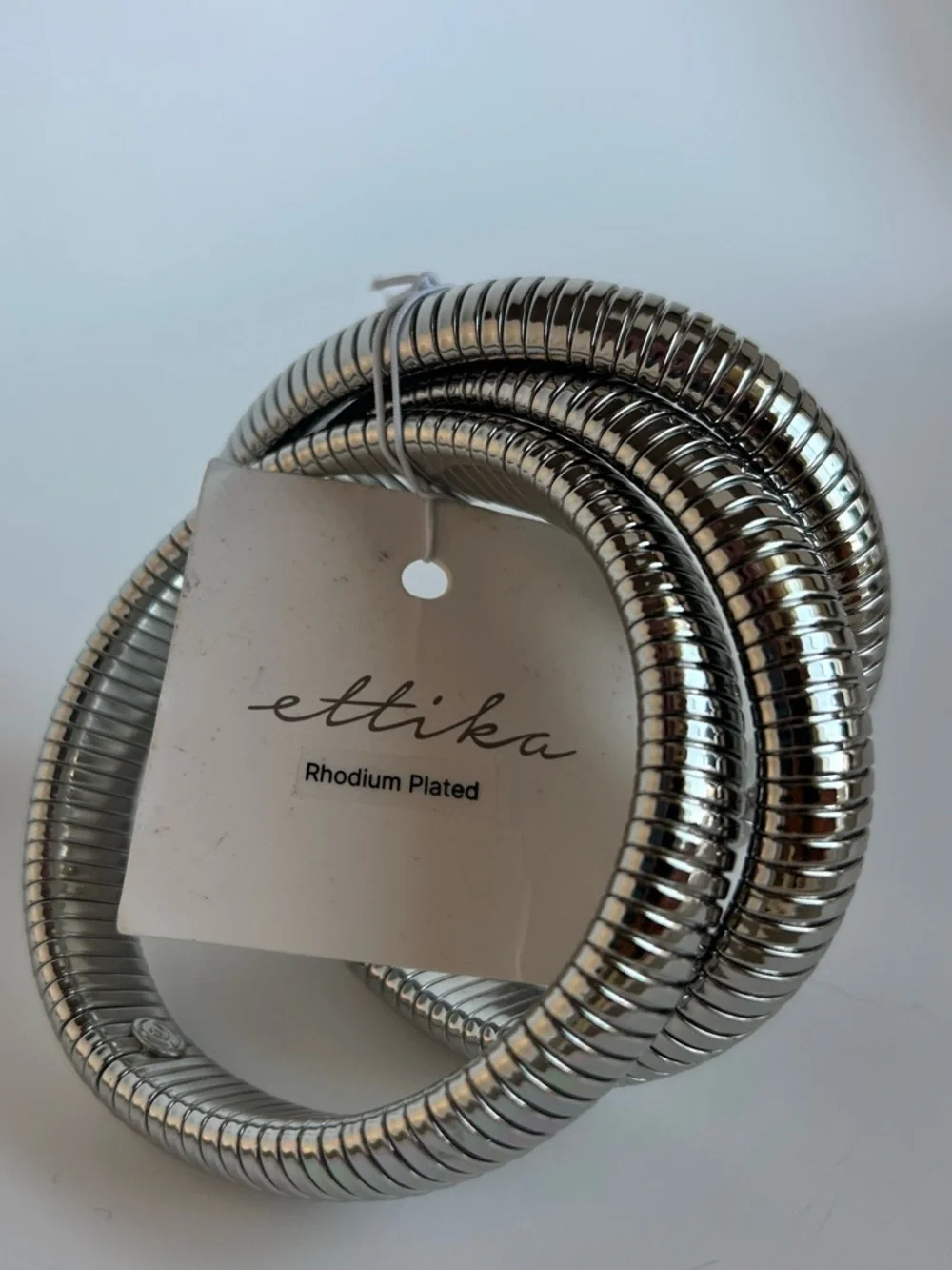 ettika Rhodium Plated Coil Stretch Bracelet in Silver - Picture 1 of 7
